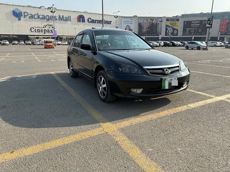 Honda civic 2004 model Golden Number laga hua ha gari ko 0