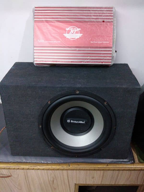 4 channel Amplifer & Subwoofer 12" wid box. 0