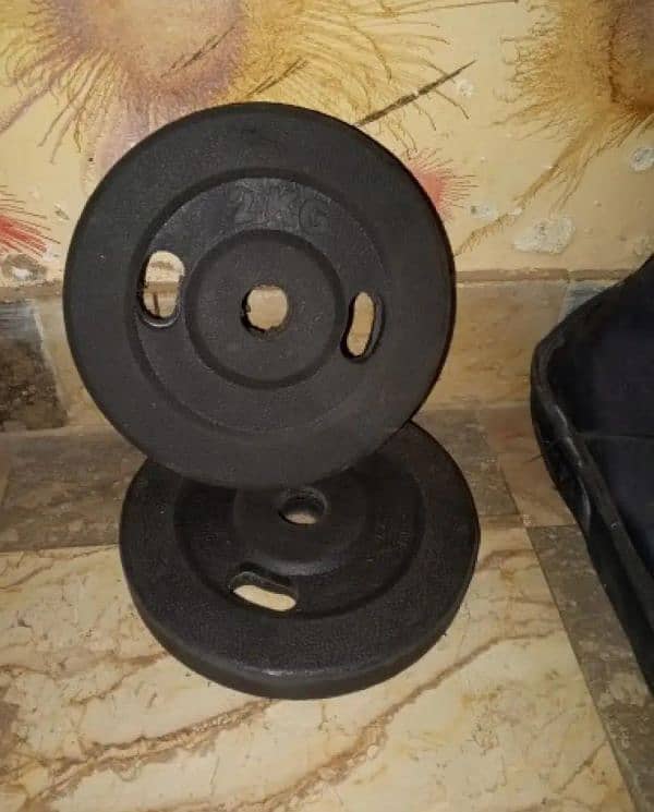 dumbbells and rubber plates with dumbbell rods and bicep rod 6