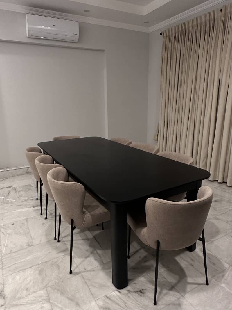 Wooden Black Dining table with 8 chairs. Keel brand 1