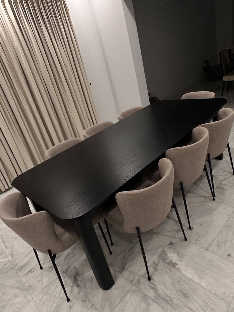 Wooden Black Dining table with 8 chairs. Keel brand 3