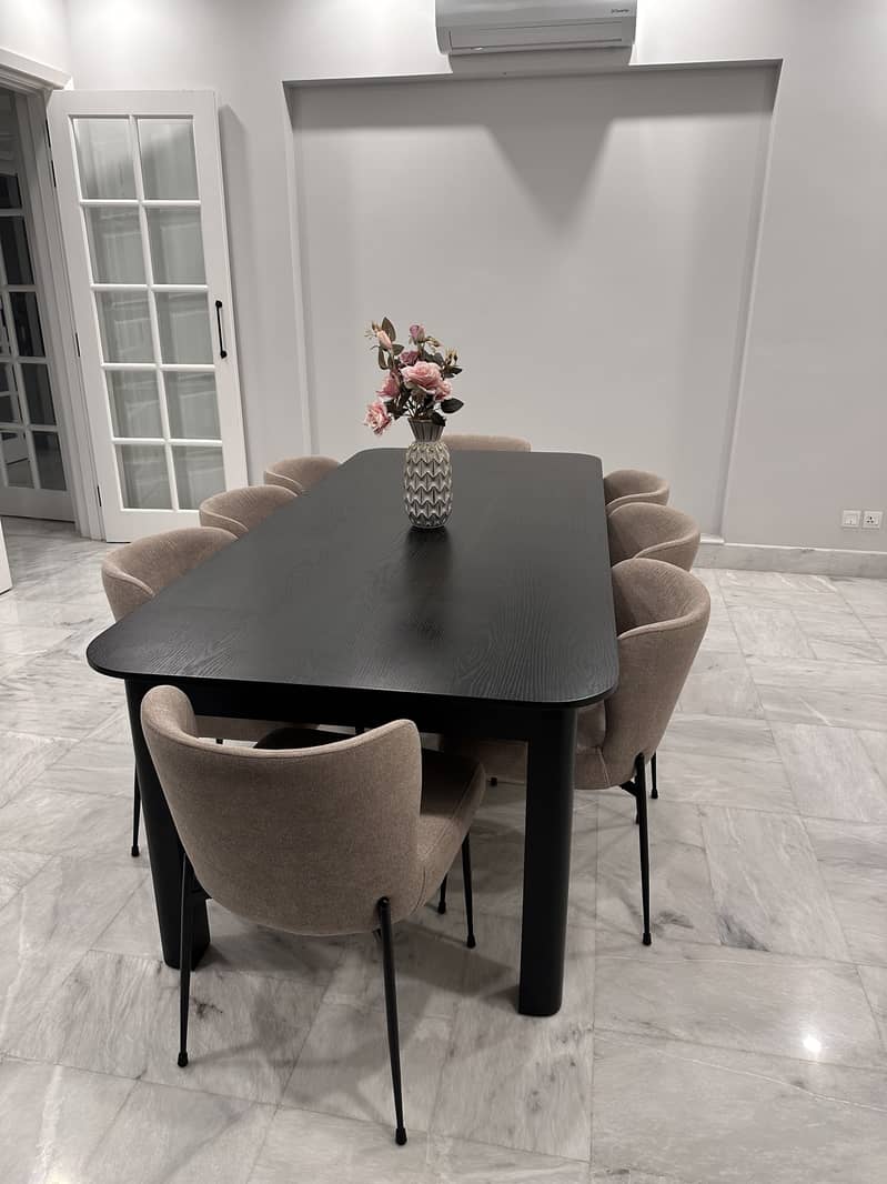 Wooden Black Dining table with 8 chairs. Keel brand 4