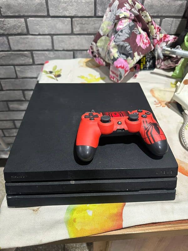 PS4 pro with 1 CD and two controllers negotiateable 1