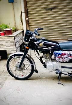 Honda 125 with double saman