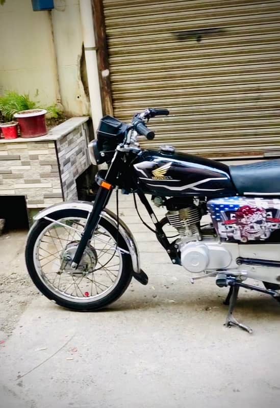 Honda 125 with double saman 0