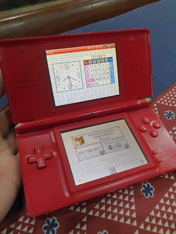 Nintendo DS Lite (with charger) 1