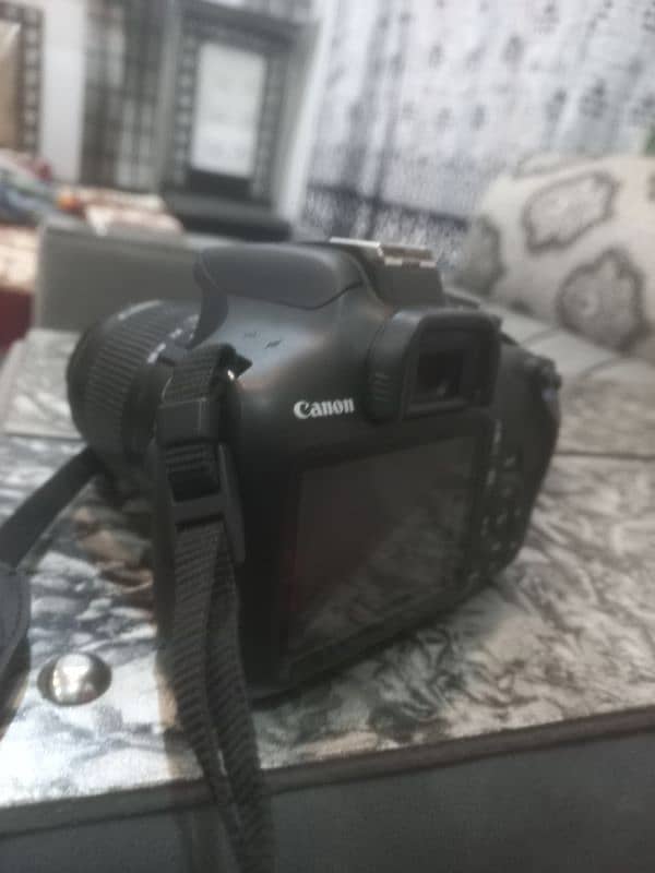 Canon 2000D Eos DSLR. . . 90000 0