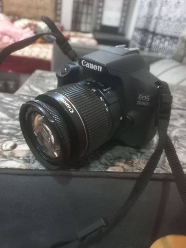 Canon 2000D Eos DSLR. . . 90000 3