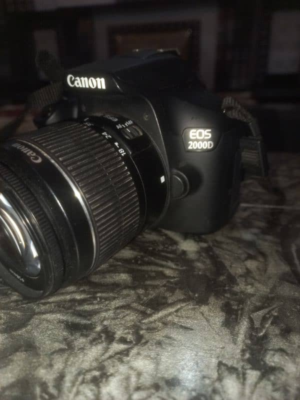 Canon 2000D Eos DSLR. . . 90000 5