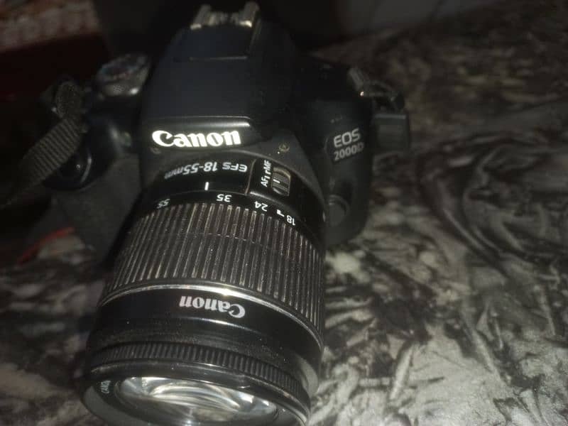 Canon 2000D Eos DSLR. . . 90000 13