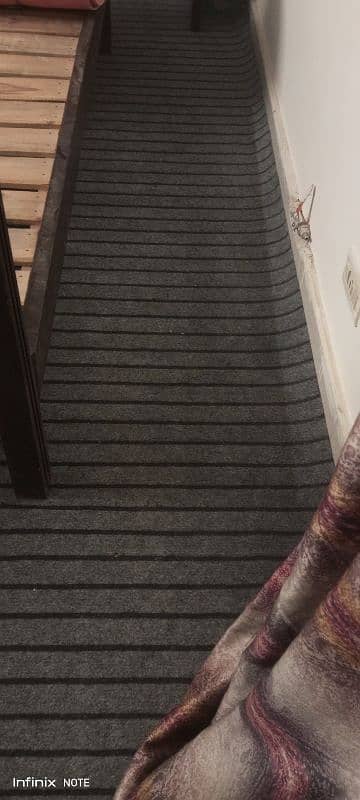 gray carpet with under lay 1