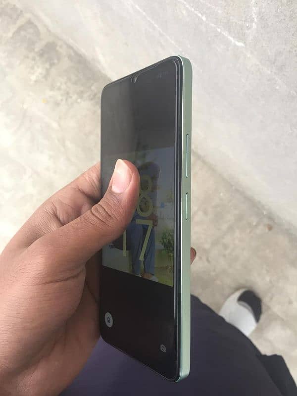 Redmi A3x with box and original charger 3