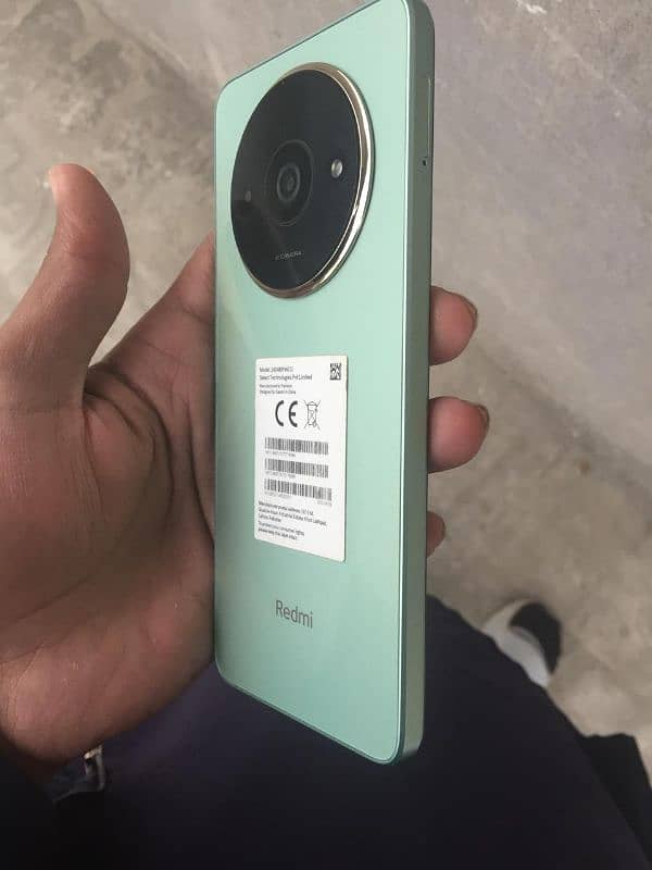 Redmi A3x with box and original charger 7