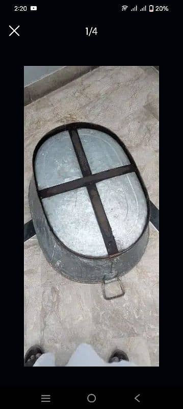 Iron bucket with handling hocks 1