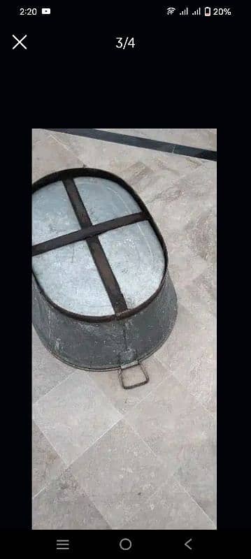 Iron bucket with handling hocks 2