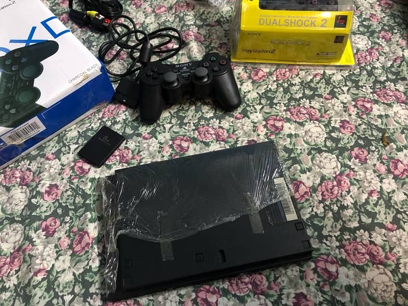 Selling my PS2 in excellent condition without games 2