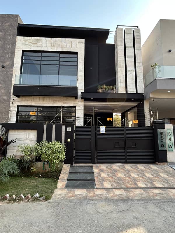 5 Marla full house available for rent in dha phase 9 town very good location 1