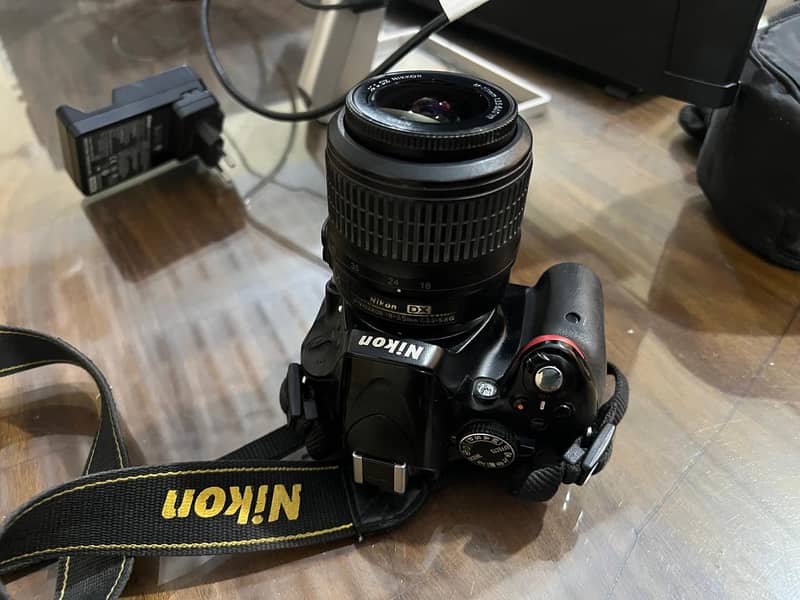 NIKON Digital D5100 with Original Strip 4