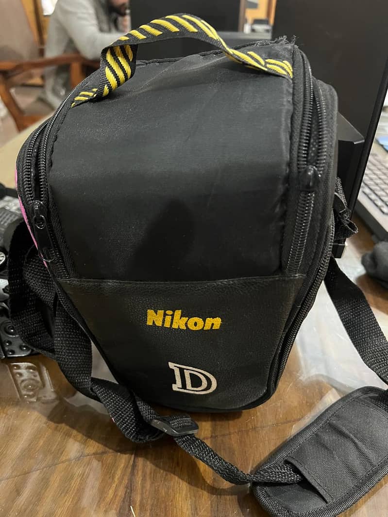 NIKON Digital D5100 with Original Strip 6