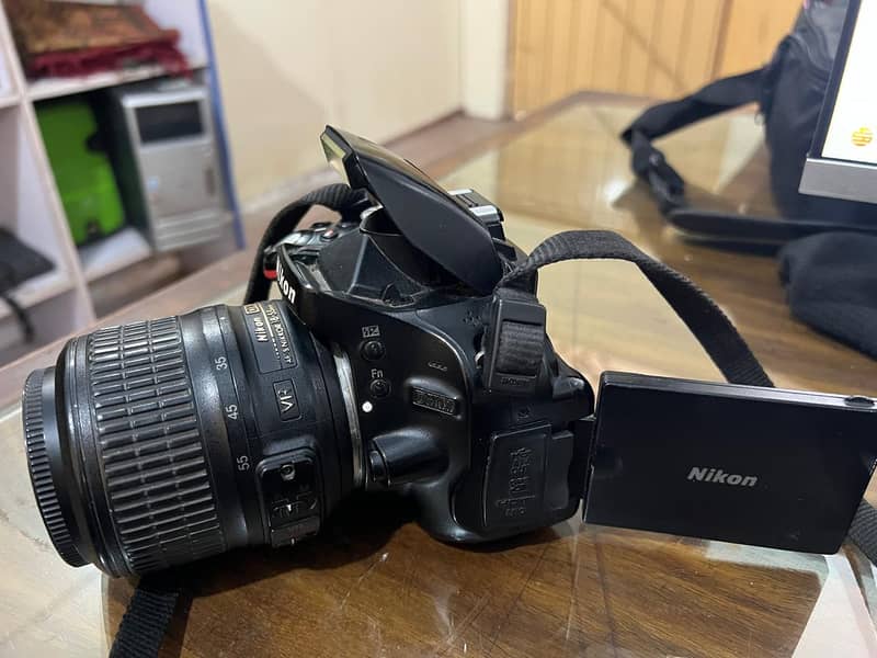 NIKON Digital D5100 with Original Strip 9