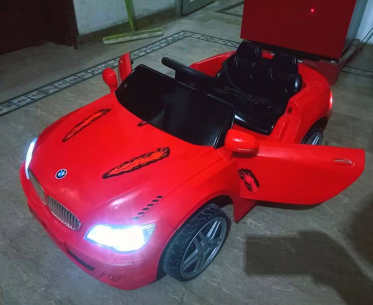 kids BMW car with swing mode/Remotecontrol, Lights,music,batery All ok 1