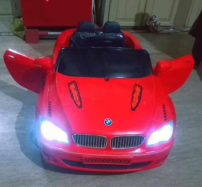 kids BMW car with swing mode/Remotecontrol, Lights,music,batery All ok 4