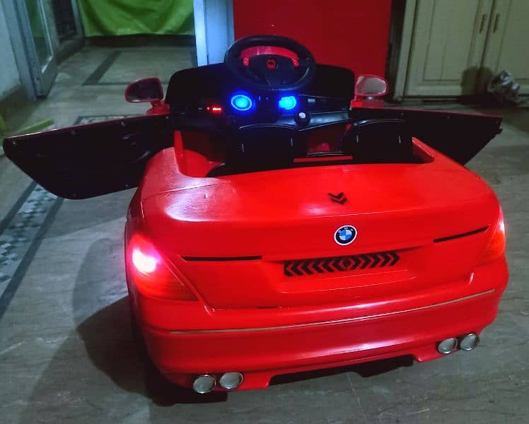 kids BMW car with swing mode/Remotecontrol, Lights,music,batery All ok 8