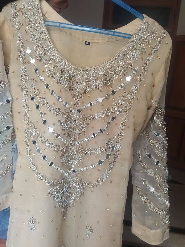 golden shirt , gharara with clutch 4