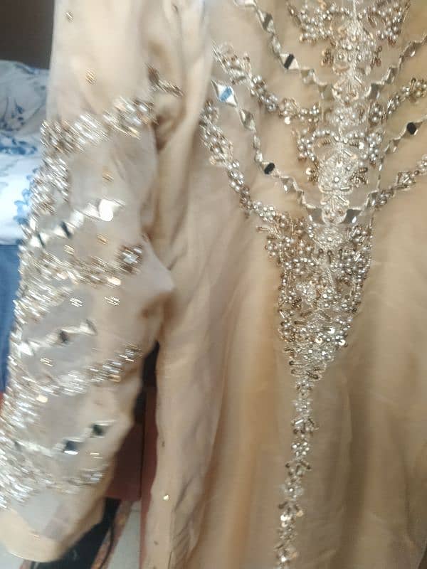 golden shirt , gharara with clutch 11