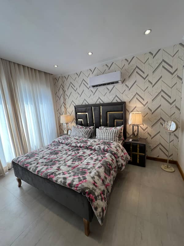 one bed luxury full furnished facing eiffel tower apartment available for rent Bahria town Lahore 13