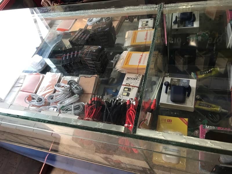 mobile shop for sale with all accessories running business 4