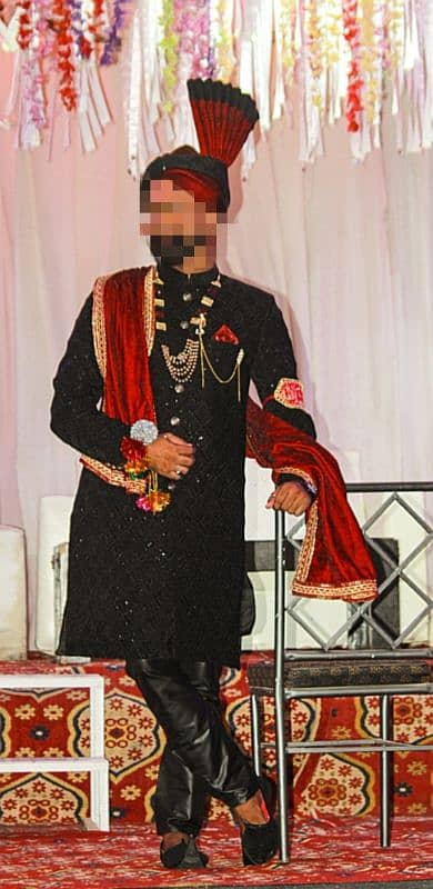 Black sherwani new condition m h urgent sell 0