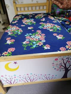 Bed with wardrobe