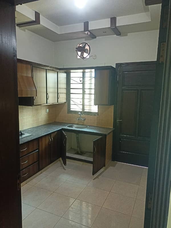 3 MARLA FLAT FOR RENT 2 BED 2 BATH TV LOUNCHJ KITCHEN WOOD WORK NEAT AND CLEAN 4