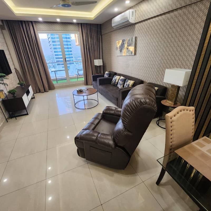 2 Bedrooms Available on Daily Basis in Elysuim tower Islamabad 14