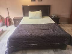 double bed with side tables