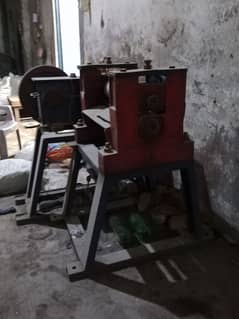 Straighter Roola Machine