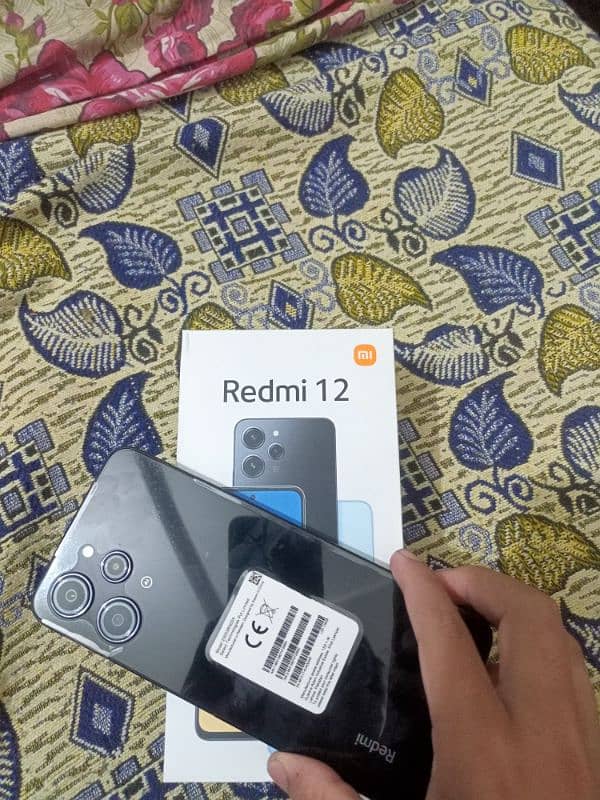 xiome Redmi 12 Brand New mobile 8_128 GB one Hand Use 0