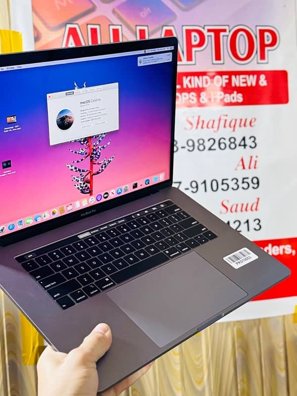 MacBook Pro  2019 core i9 ram 32 512 ssd 4 gb card 15 inch screen 1