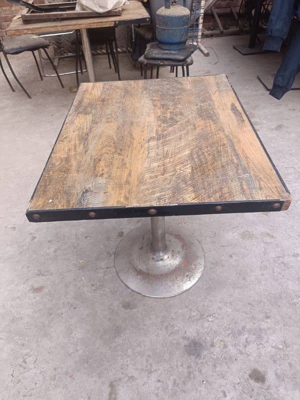 10 steel tables with different sizes and 8 chairs. 0