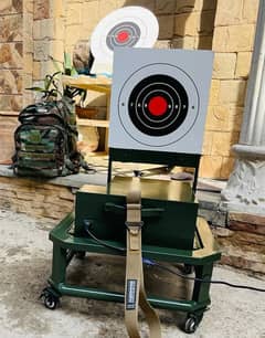 Automatic pop up target for shooting range