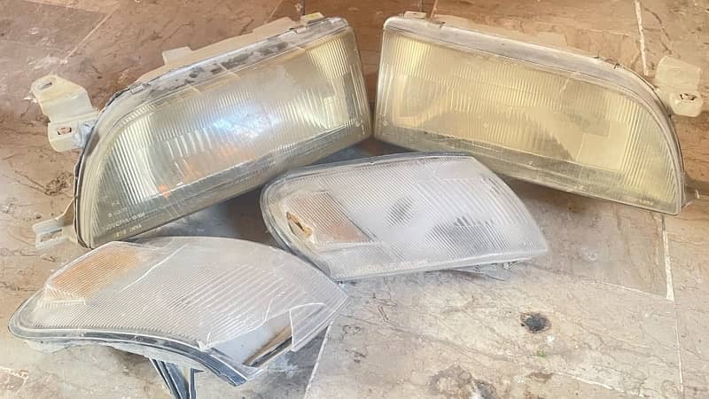 indus corolla geniune front lights and parking lights 0