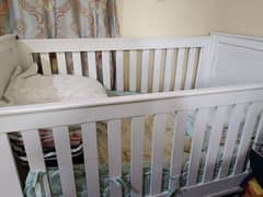 solid wooden cot