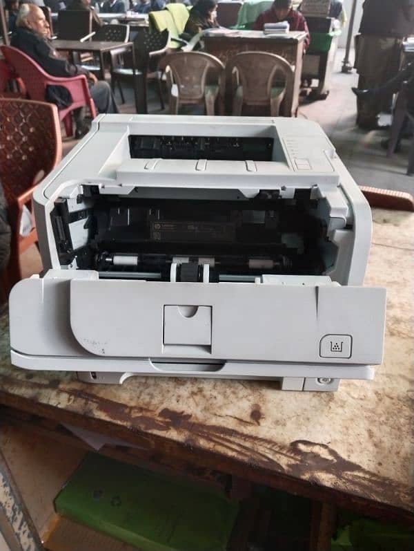 Used Printer HP 2035 only refill required 2