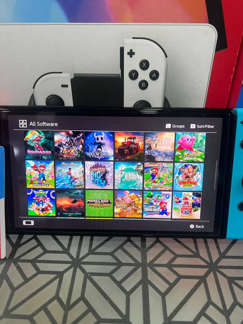 NINTENDO SWITCH OLED +256GB+GAMES AT MY GAMES 1