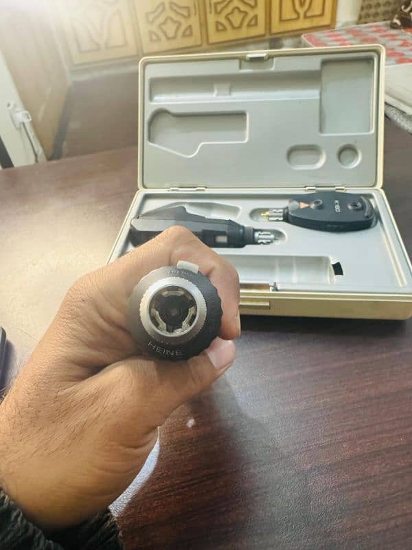 Heine ophthalmoscope and Retinoscope 6