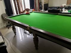 Snooker table and sticks