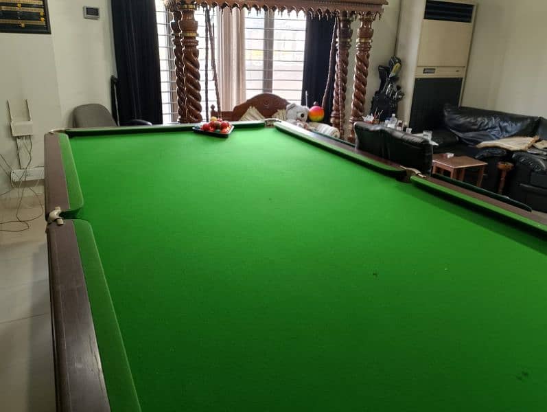 Snooker table and sticks 1