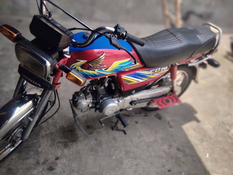 Honda 70 2020 K last ma nikli ha 21 ka sticker Laga ha 2