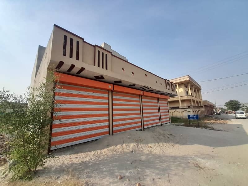 9 Marla Property Including 5 Marla Triple Storey House With 4 Shops Available For Sale In Lalazar2 3